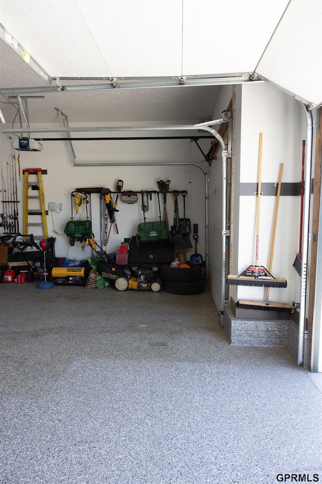 garage featuring a garage door opener