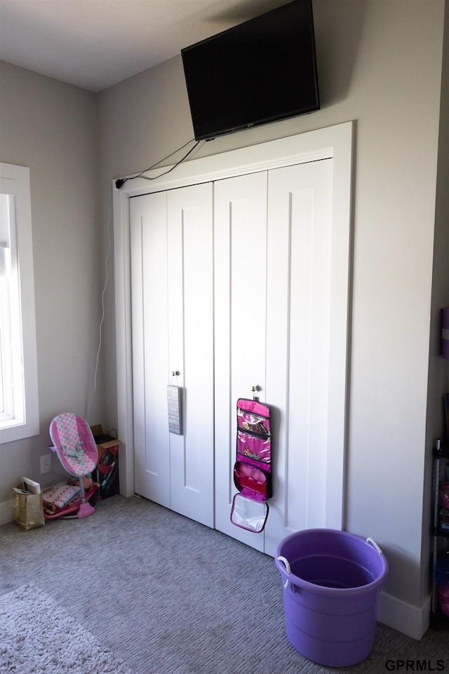 playroom featuring carpet flooring