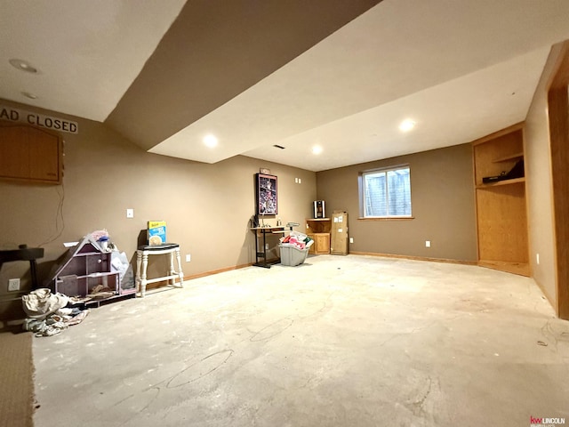 below grade area featuring recessed lighting and baseboards