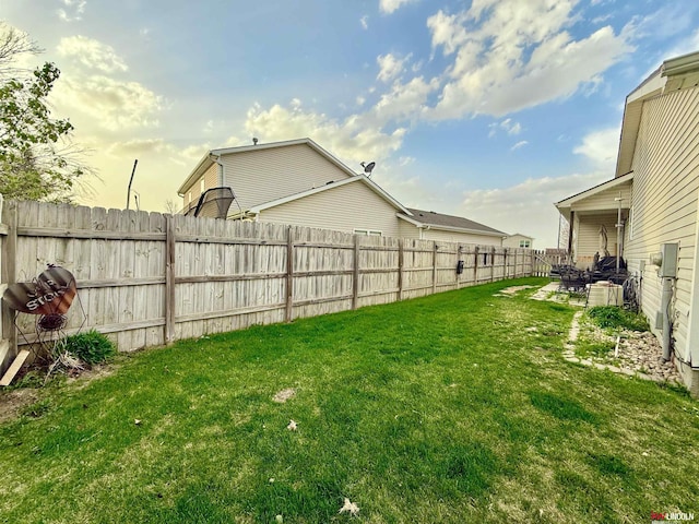 view of yard featuring a fenced backyard