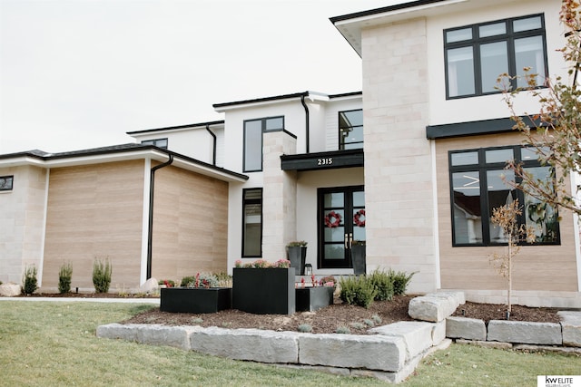 modern home featuring french doors