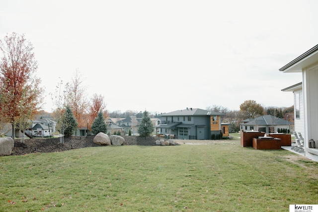 view of yard featuring a residential view