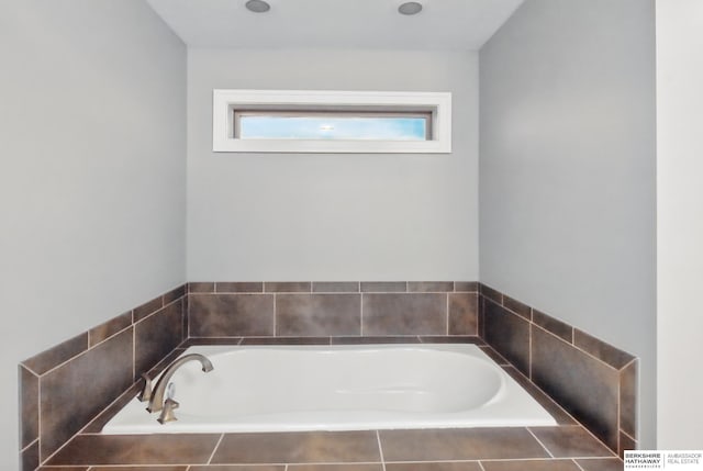 bathroom with a garden tub