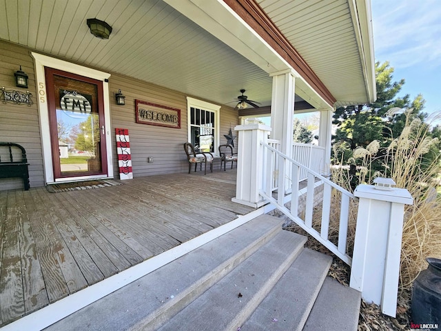 wooden terrace with a porch