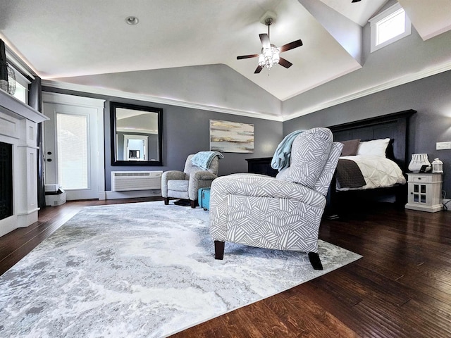 bedroom featuring lofted ceiling, ceiling fan, a wall mounted AC, a fireplace, and wood finished floors