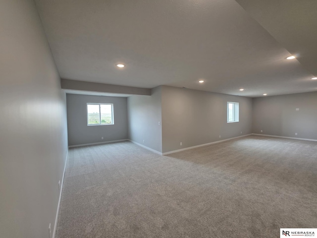 interior space with recessed lighting and baseboards