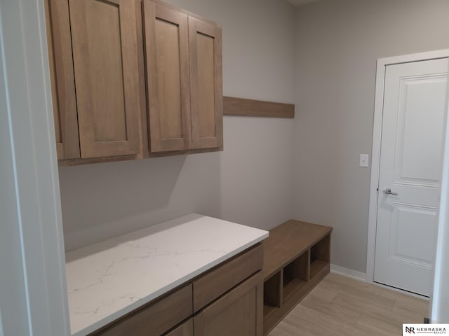 mudroom featuring baseboards