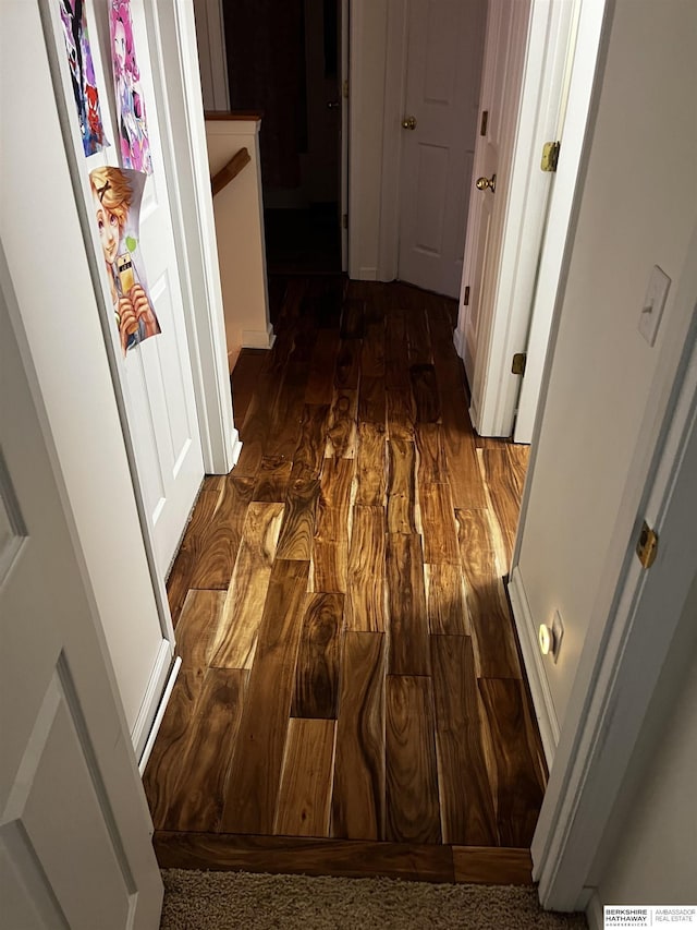 corridor with wood finished floors