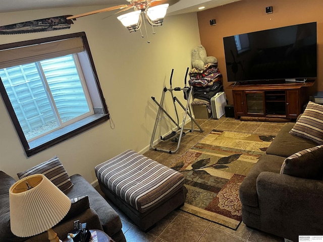 tiled living room featuring a ceiling fan and recessed lighting