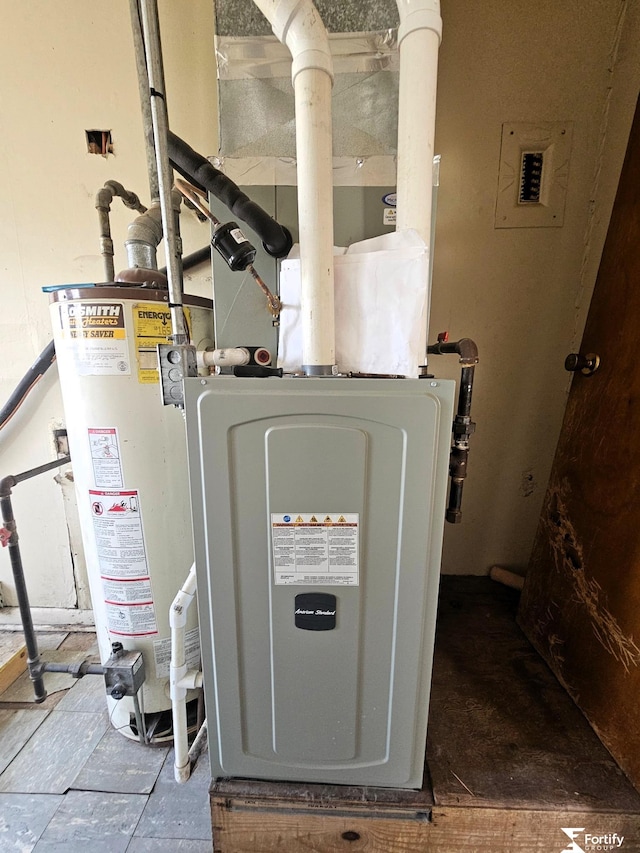 utilities with gas water heater and heating unit