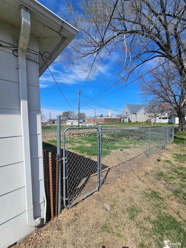 exterior space with a gate and fence