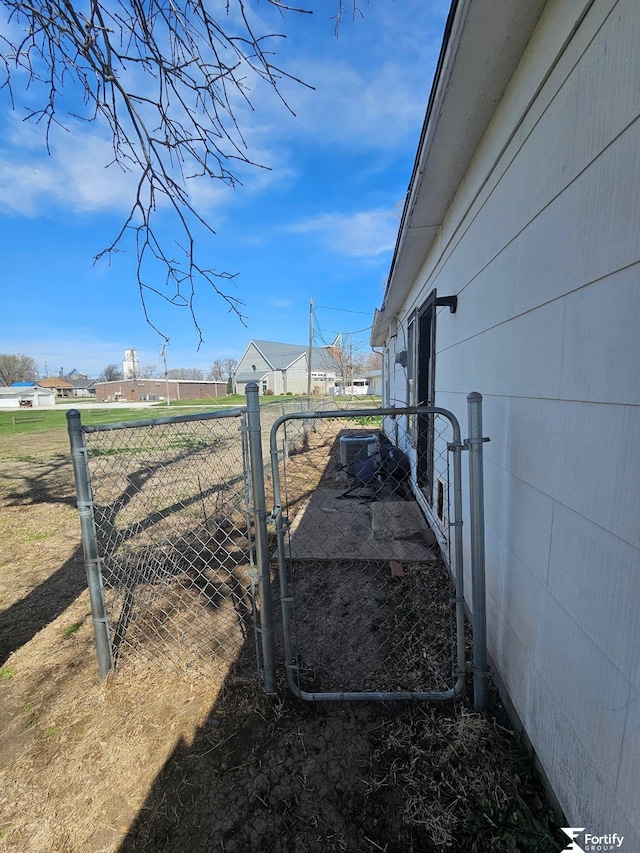 view of yard with a gate and fence