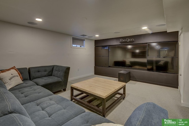 carpeted living room with recessed lighting, visible vents, and baseboards