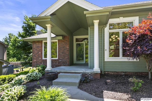 doorway to property featuring a porch