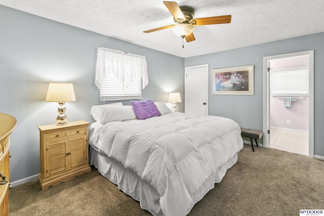 carpeted bedroom with baseboards, ceiling fan, and a textured ceiling
