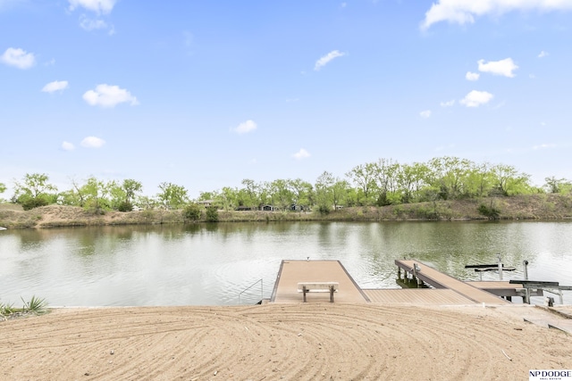 view of dock with a water view