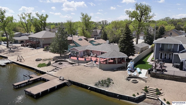 aerial view featuring a water view and a residential view