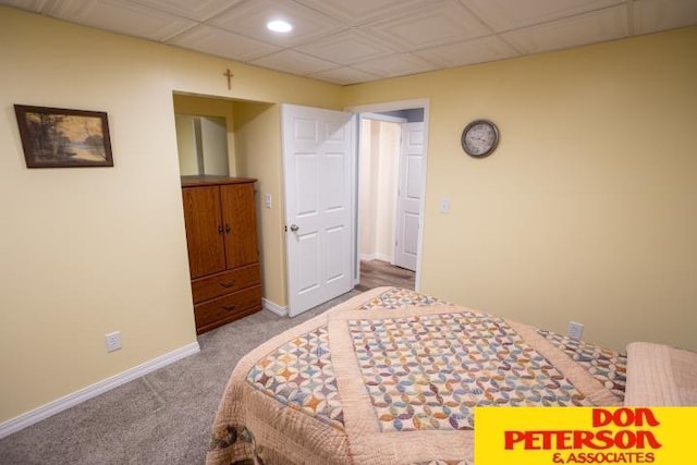 carpeted bedroom with recessed lighting and baseboards