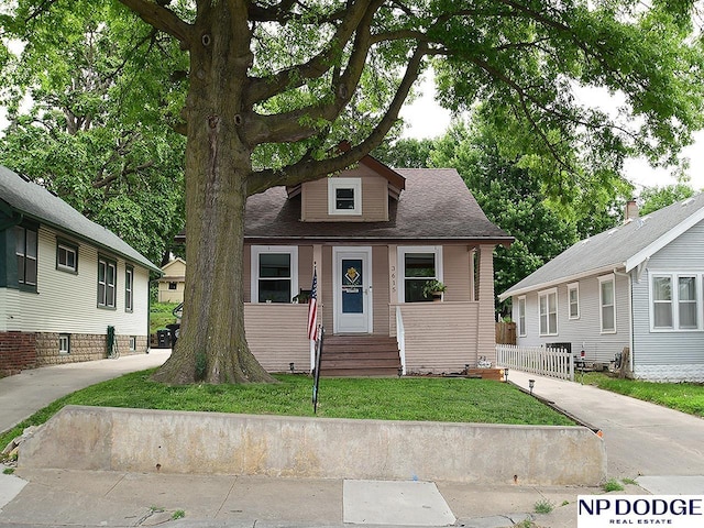 3615 N 60th St, Omaha, NE 68104 - bungalow-style home featuring roof with shingles