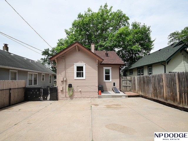 3615 N 60th St, Omaha, NE 68104 - back of house featuring a patio area