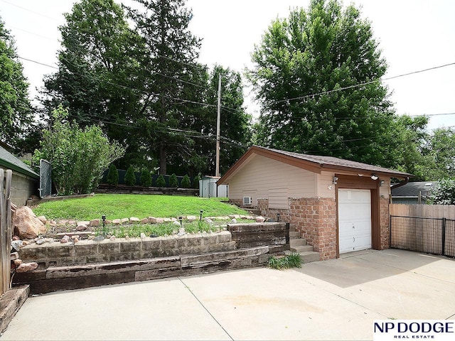 3615 N 60th St, Omaha, NE 68104 - garage with concrete driveway