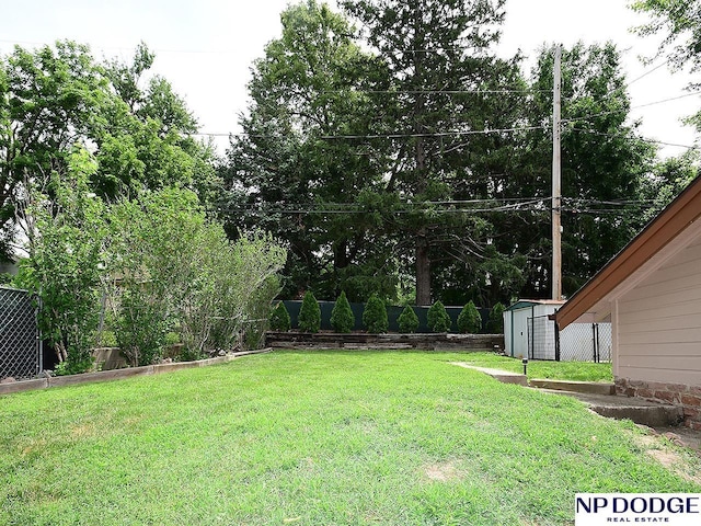 3615 N 60th St, Omaha, NE 68104 - view of yard featuring a storage shed