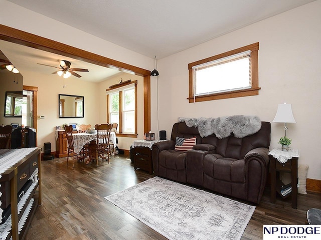 3615 N 60th St, Omaha, NE 68104 - living area featuring healthy amount of natural light, dark wood-style flooring, and a ceiling fan