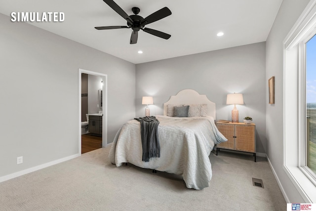 carpeted bedroom featuring ceiling fan, ensuite bath, visible vents, baseboards, and recessed lighting
