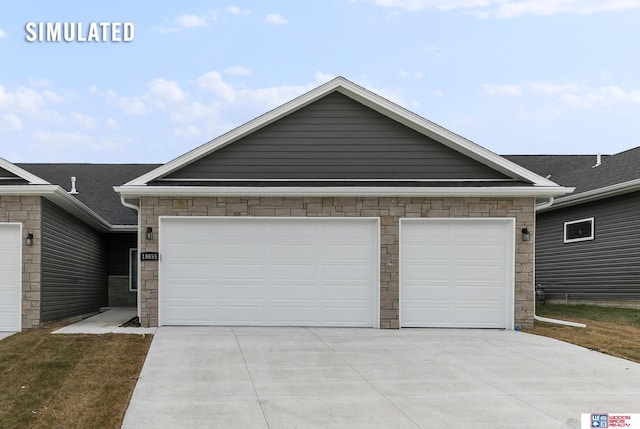 view of front of property featuring a garage and stone siding