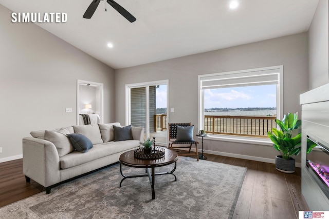 living room with lofted ceiling, wood finished floors, baseboards, recessed lighting, and a ceiling fan