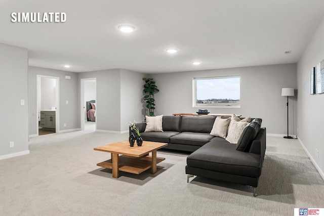 living area featuring recessed lighting, baseboards, and light carpet