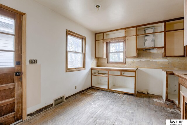 kitchen featuring visible vents, light countertops, and light wood finished floors