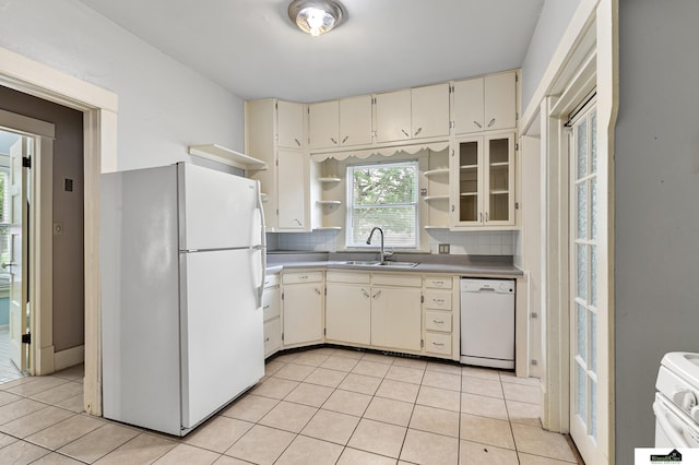 3218 Holdrege St, Lincoln, NE 68503 - kitchen with cream cabinets, white appliances, a sink, and open shelves