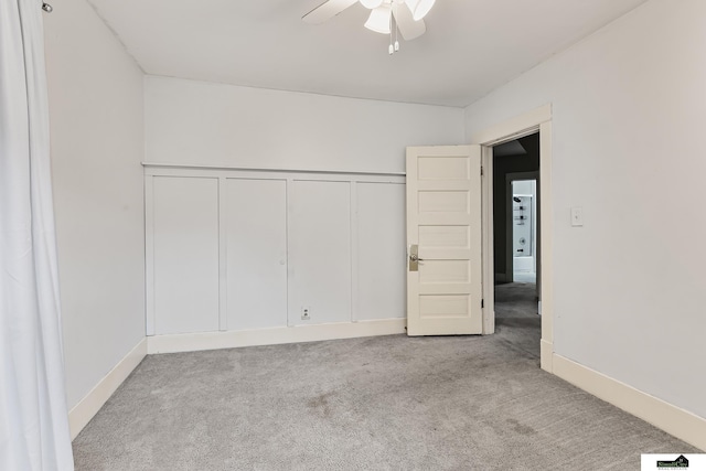 3218 Holdrege St, Lincoln, NE 68503 - unfurnished bedroom featuring carpet floors, a closet, ceiling fan, and baseboards
