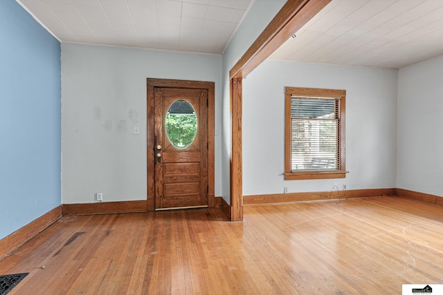 3218 Holdrege St, Lincoln, NE 68503 - foyer with hardwood / wood-style floors, baseboards, and crown molding