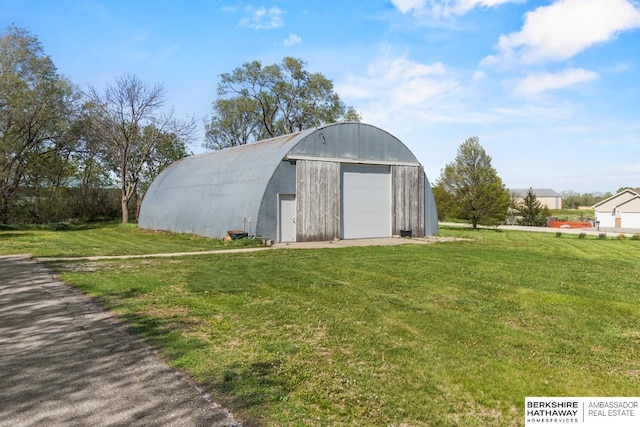 6301 SW 34th Ct, Lincoln, NE 68523 - view of pole building with a yard