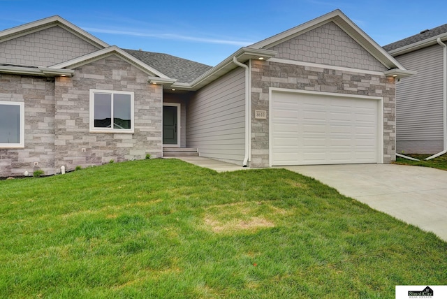 view of front of home with a garage, a front yard, stone siding, and concrete driveway
