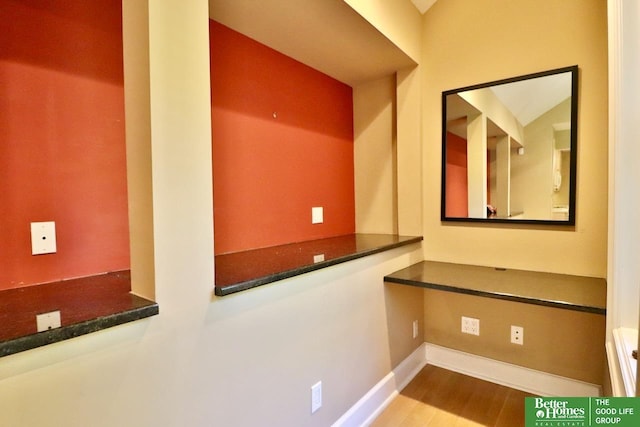 5506 Howard St, Omaha, NE 68106 - hallway with wood finished floors and baseboards
