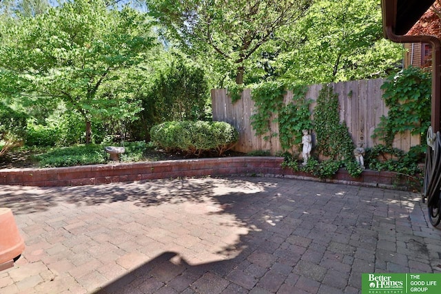 5506 Howard St, Omaha, NE 68106 - view of patio / terrace featuring fence