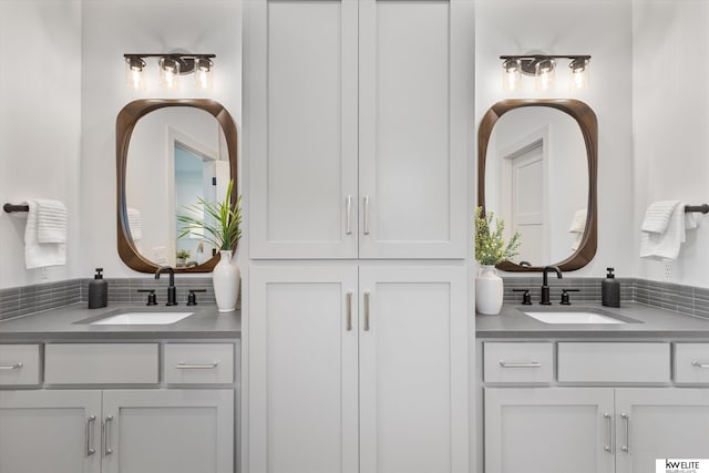 bathroom featuring two vanities