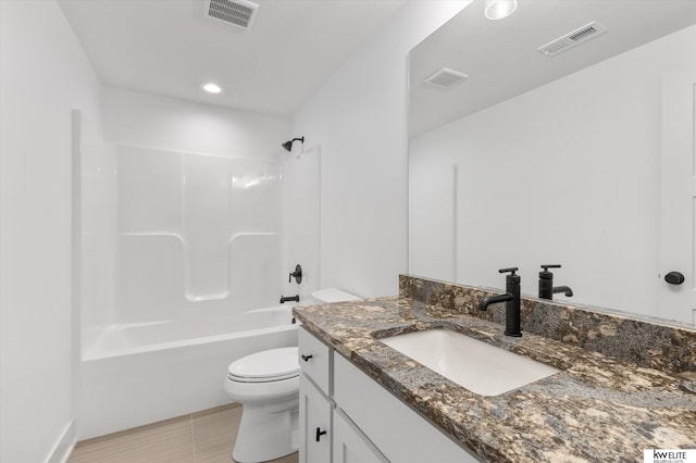 full bath featuring toilet, vanity, shower / bath combination, and recessed lighting