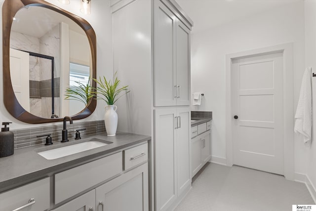 bathroom featuring vanity and a stall shower