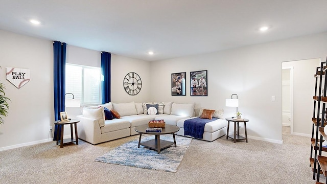 living room with recessed lighting, baseboards, and carpet