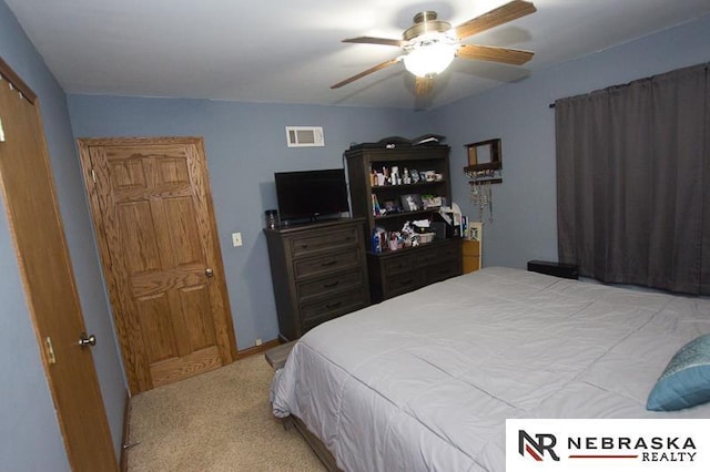 bedroom featuring ceiling fan, carpet, and visible vents