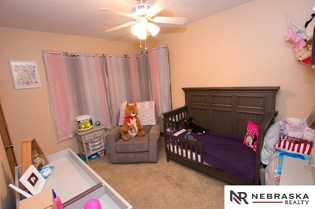 carpeted bedroom featuring ceiling fan