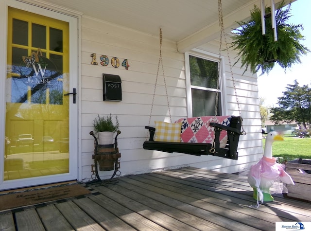 wooden deck with covered porch