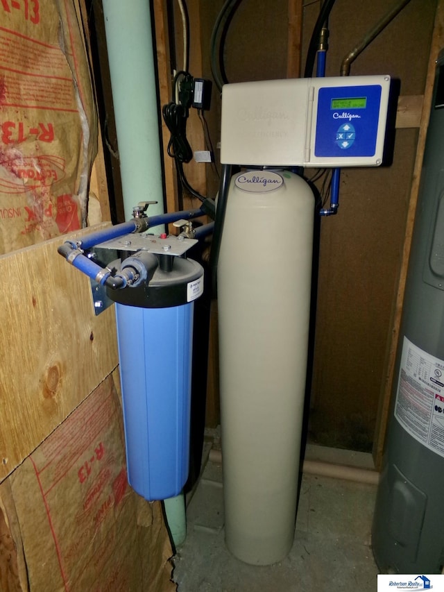 utility room with water heater