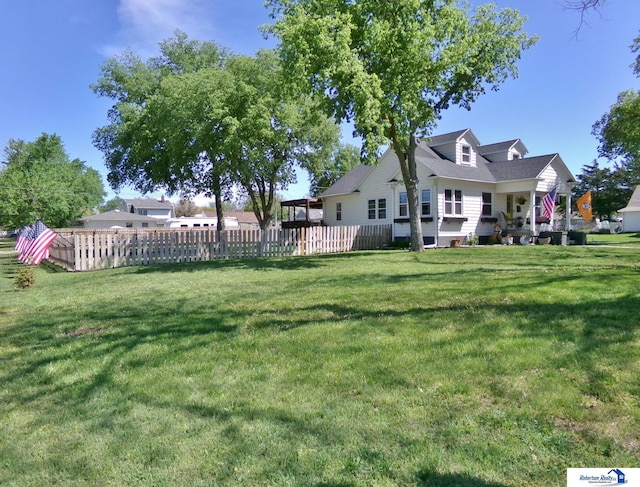 view of yard featuring fence
