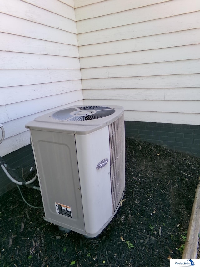 exterior details featuring central AC