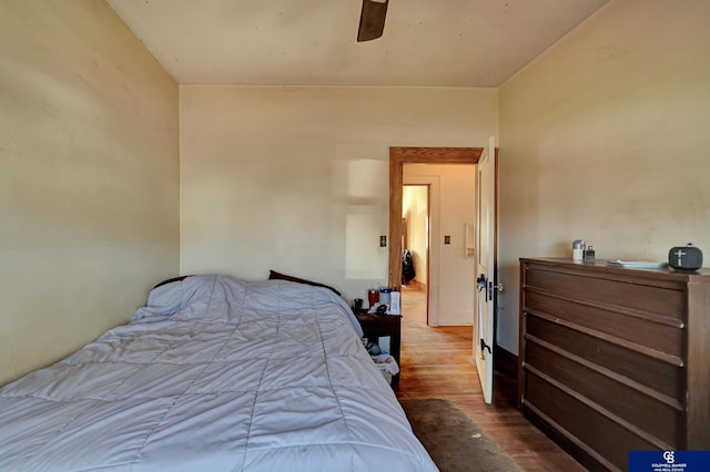 bedroom featuring ceiling fan and wood finished floors